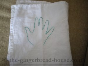 embroidered handprint