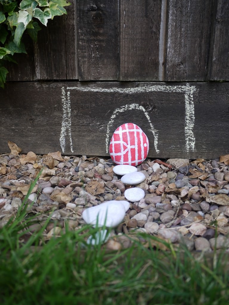 painted stone fairy door - the gingerbread house