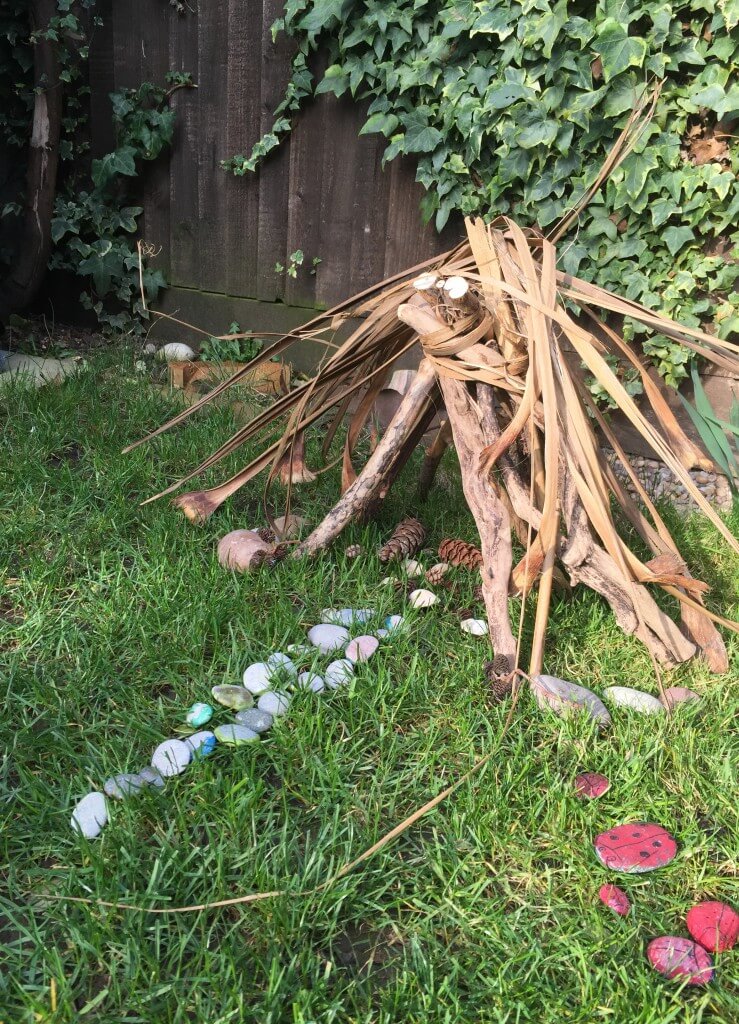fairy house made from sticks and stones