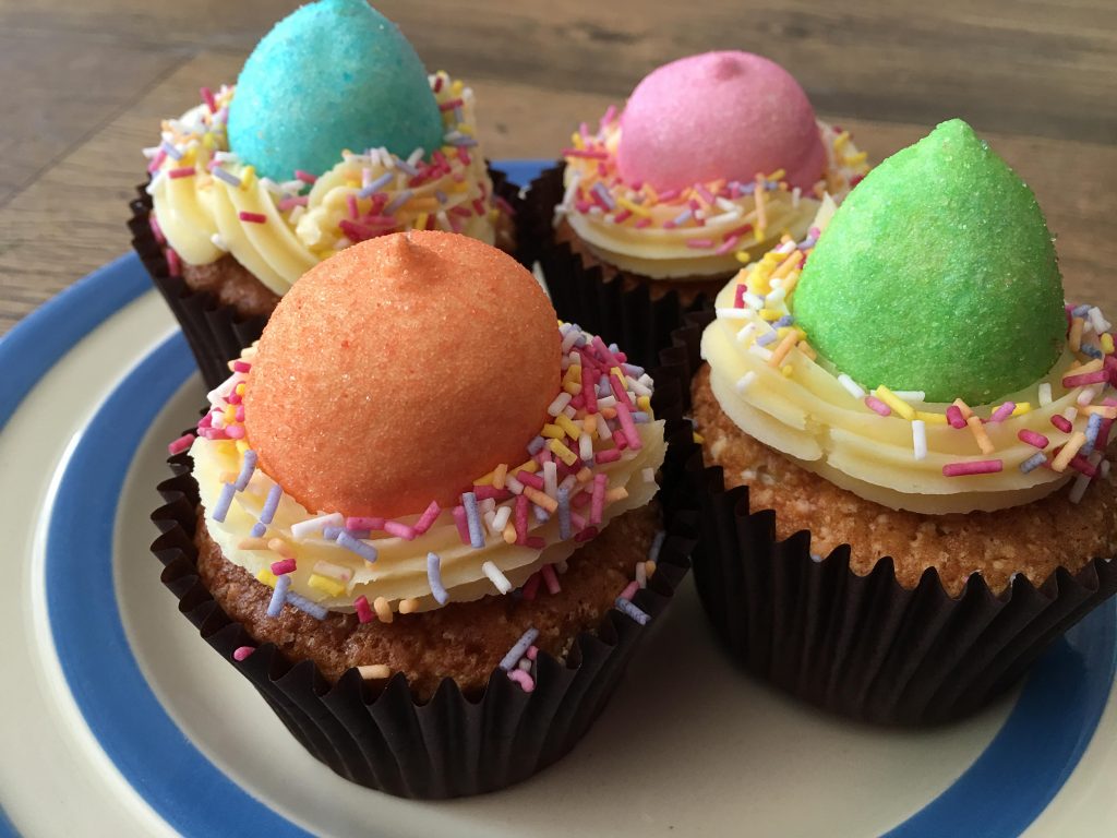 Colourful unicorn poop cupcakes