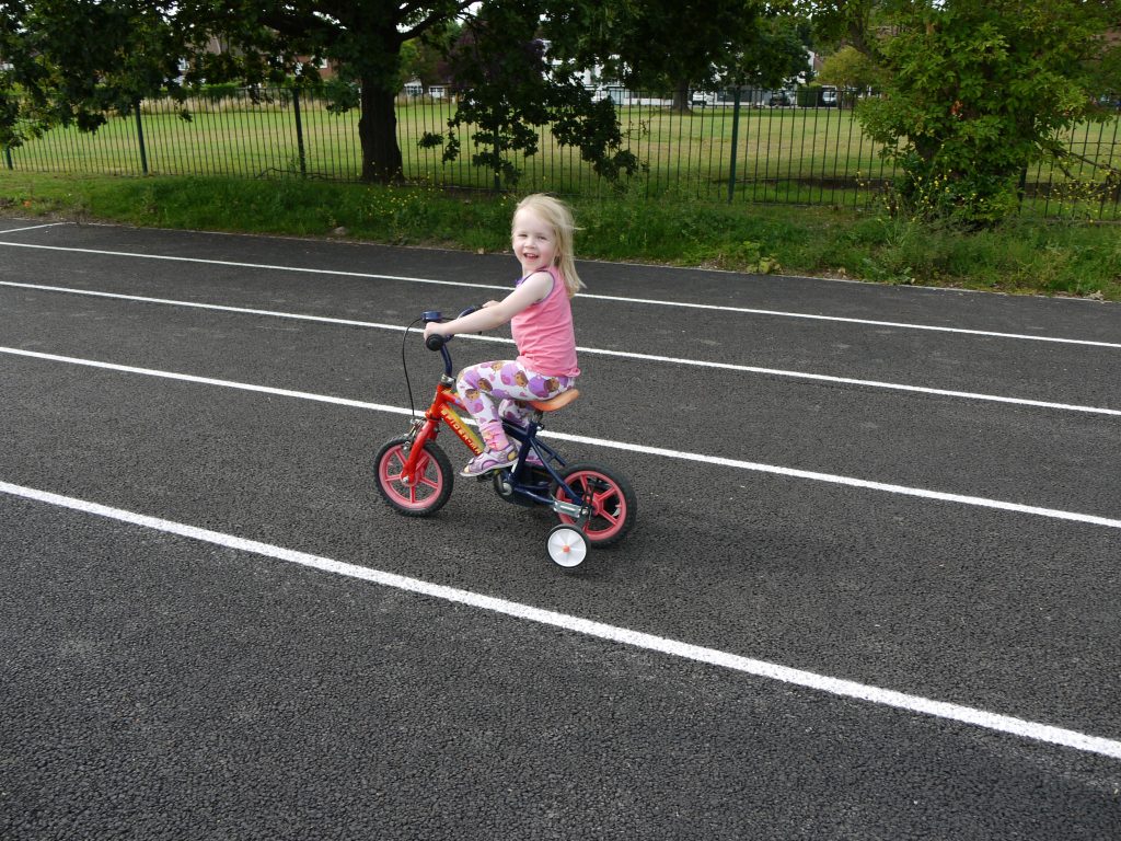 learning to cycle at the running track