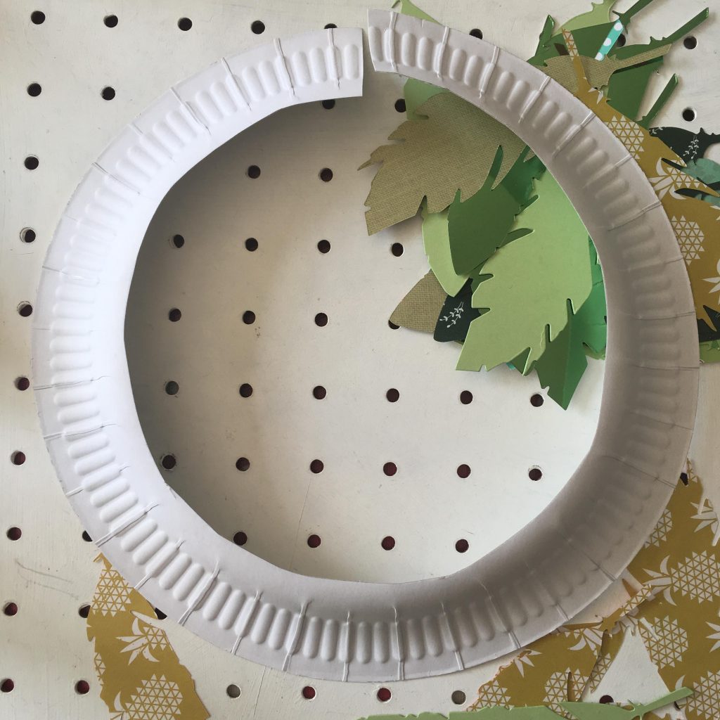 Paper plate laurel wreath craft for kids