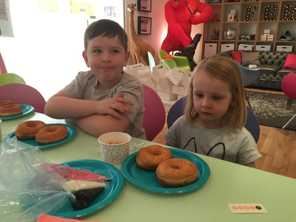 Learning the art of donut decorating